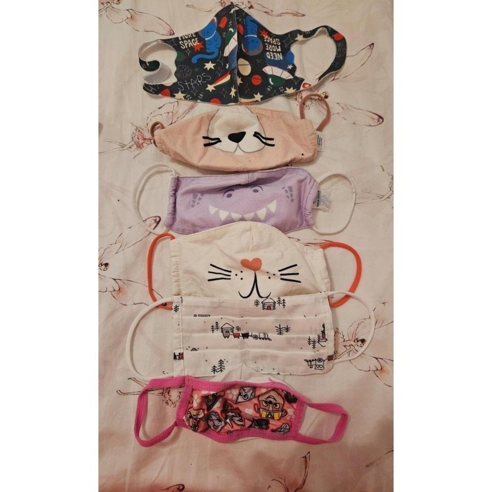 Toddler girl masks lot